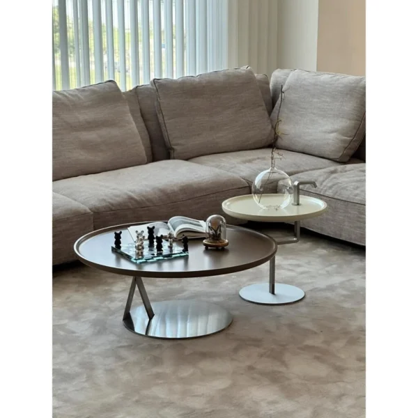 Yuanman Round Coffee Table Set with Tray Tops in black — in a room setting