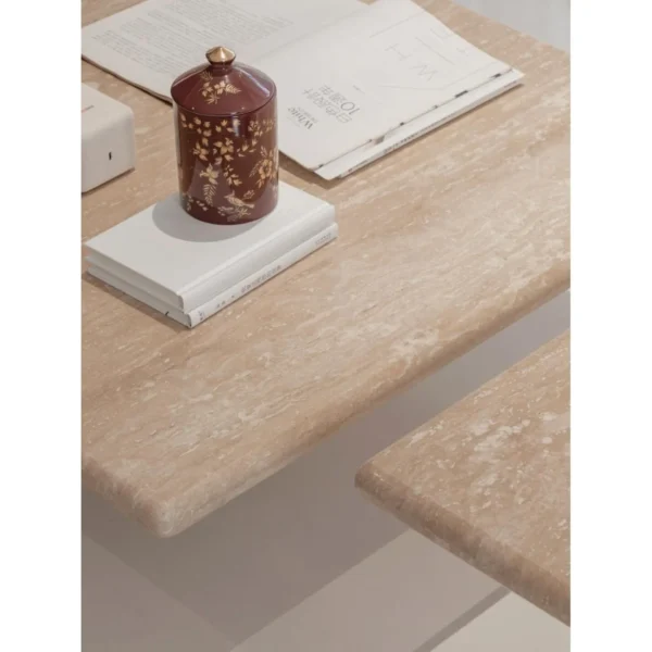 Yuexin Travertine Coffee Table Pair on Cylinder Bases in sand — in a room setting