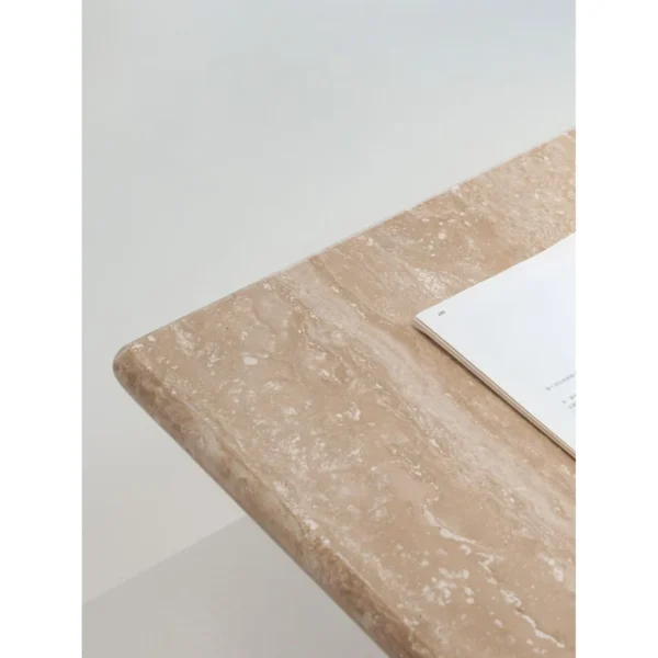 Yuexin Travertine Coffee Table Pair on Cylinder Bases in sand — in a room setting