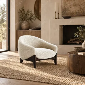 Yunqi Cloud Bouclé Tub Chair on Dark Wood Base in ivory — in a room setting
