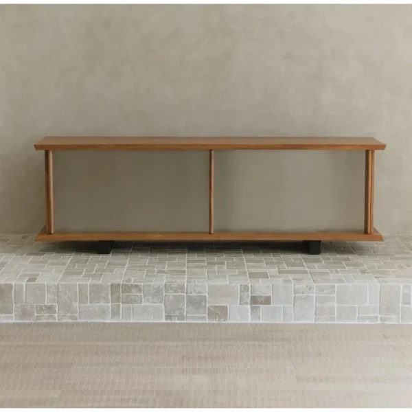 Yushu Teak and Brushed Steel Low TV Cabinet with Curved Ends in clay — in a room setting