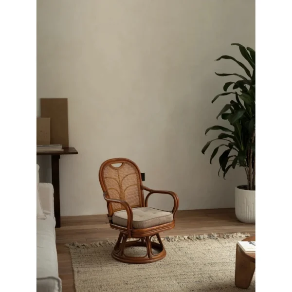 Fan-Back Rattan Swivel Lounge Chair with Cushion in clay — in a room setting