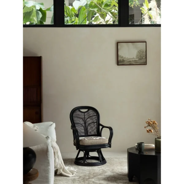 Fan-Back Rattan Swivel Lounge Chair with Cushion in clay — in a room setting