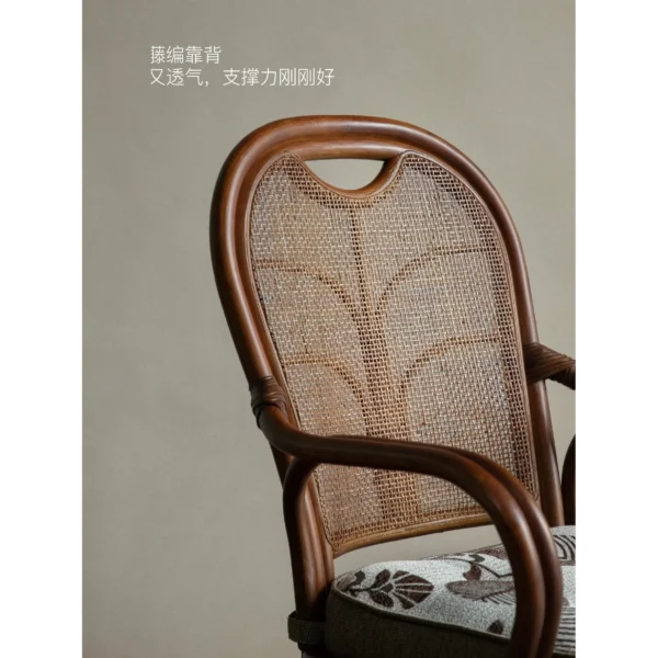 Fan-Back Rattan Swivel Lounge Chair with Cushion in clay — in a room setting