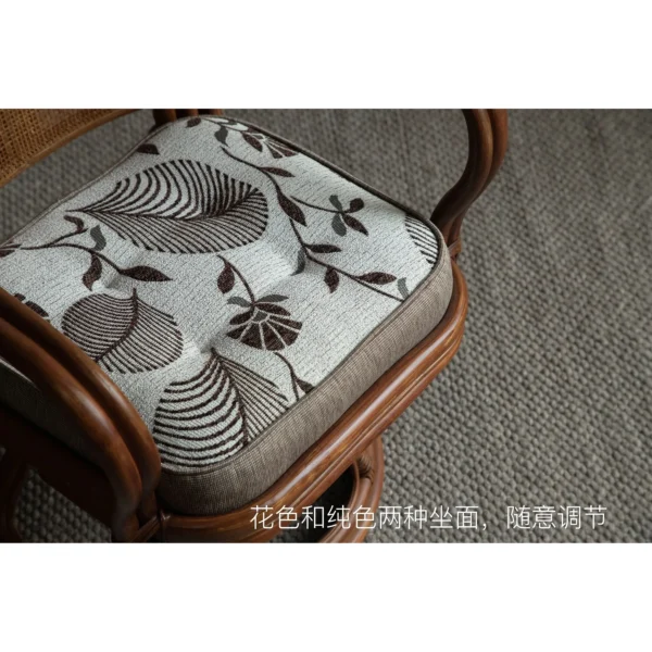 Fan-Back Rattan Swivel Lounge Chair with Cushion in clay — in a room setting
