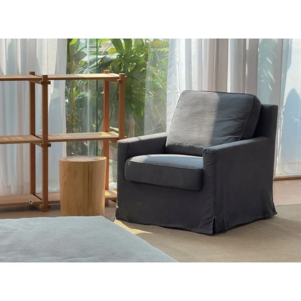 Navy Slipcovered Solid Wood Frame Armchair in blue — in a room setting