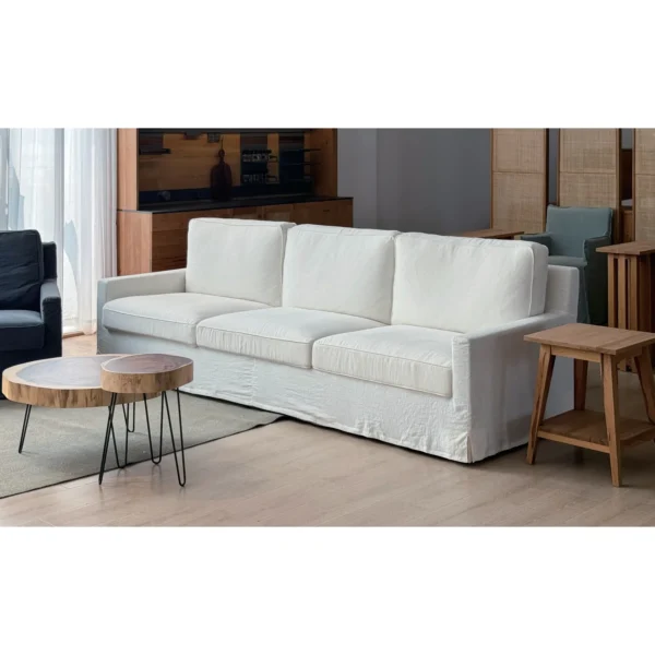 Slipcovered Three-Seat Sofa in White Fabric — in a room setting