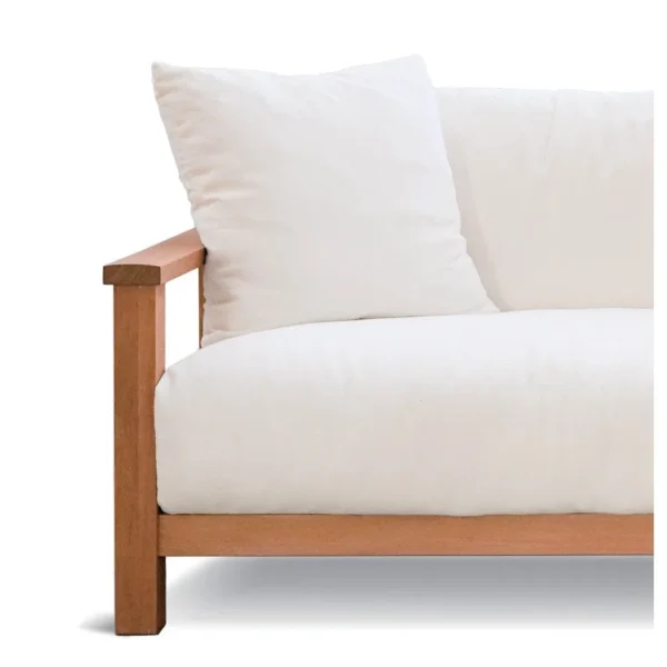 Solid Wood Frame Sofa with White Cushions and Wood Arms in natural oak — in a room setting