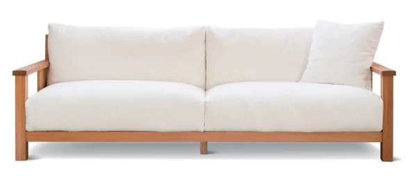 Solid Wood Frame Sofa with White Cushions and Wood Arms in natural oak — in a room setting
