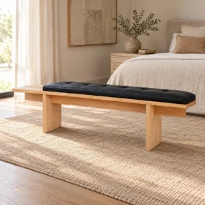 Oak Bench with Black Leather Button Cushion in natural oak — in a room setting