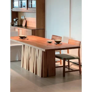 Solid Wood Dining Table on Fluted Plank Pedestal in natural oak — in a room setting