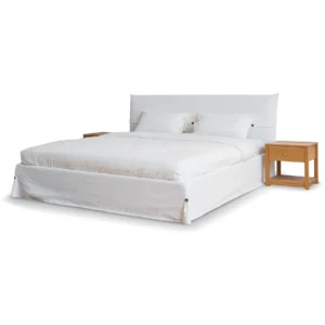 White Slipcovered Bed with Pillow Headboard in ivory — front view