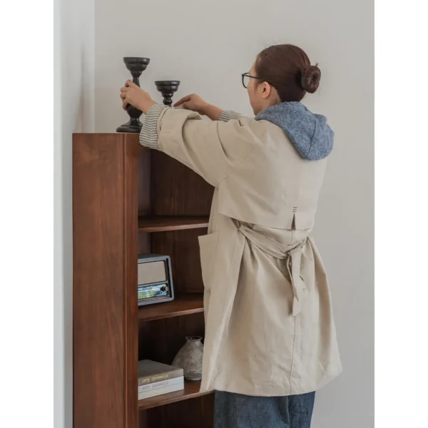 Solid Pine Open Display Cabinet with Turned Legs in clay — in a room setting