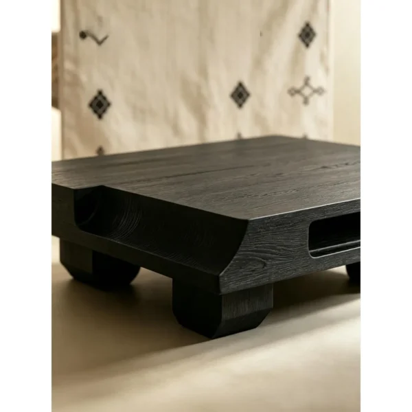 Zhuomu Rustic Solid Wood Block Coffee Table in Black — in a room setting