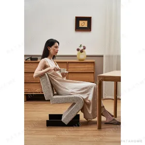 Z-Form Upholstered Cantilever Chair in Cream Bouclé — in a room setting