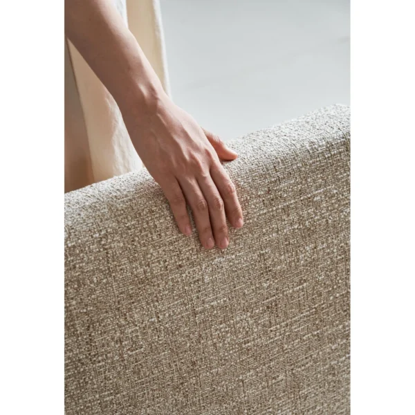 Z-Form Upholstered Cantilever Chair in Cream Bouclé — in a room setting