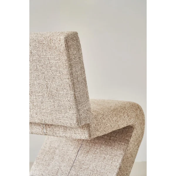Z-Form Upholstered Cantilever Chair in Cream Bouclé — in a room setting