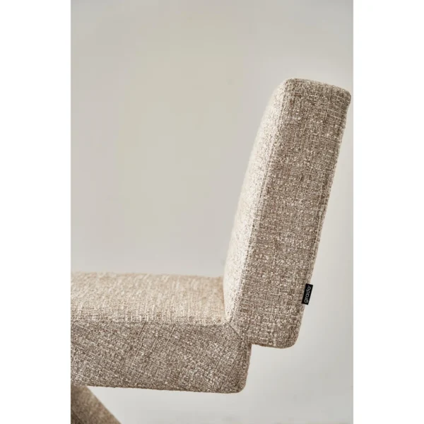 Z-Form Upholstered Cantilever Chair in Cream Bouclé — in a room setting