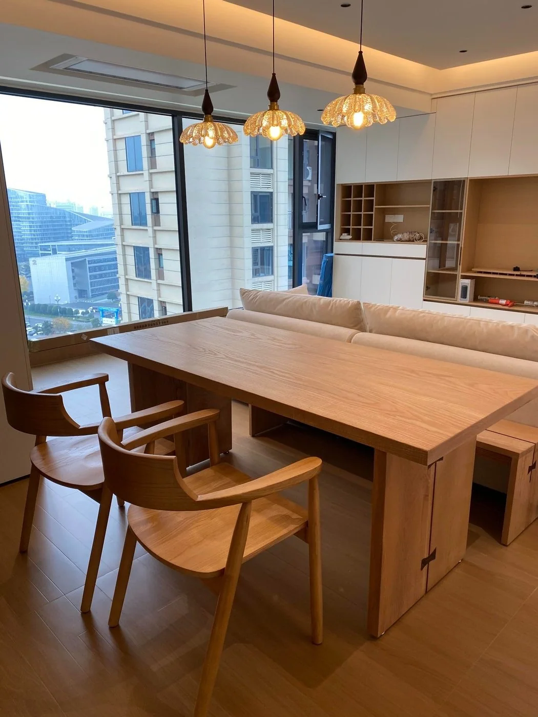 Ash dining table in a contemporary apartment interior