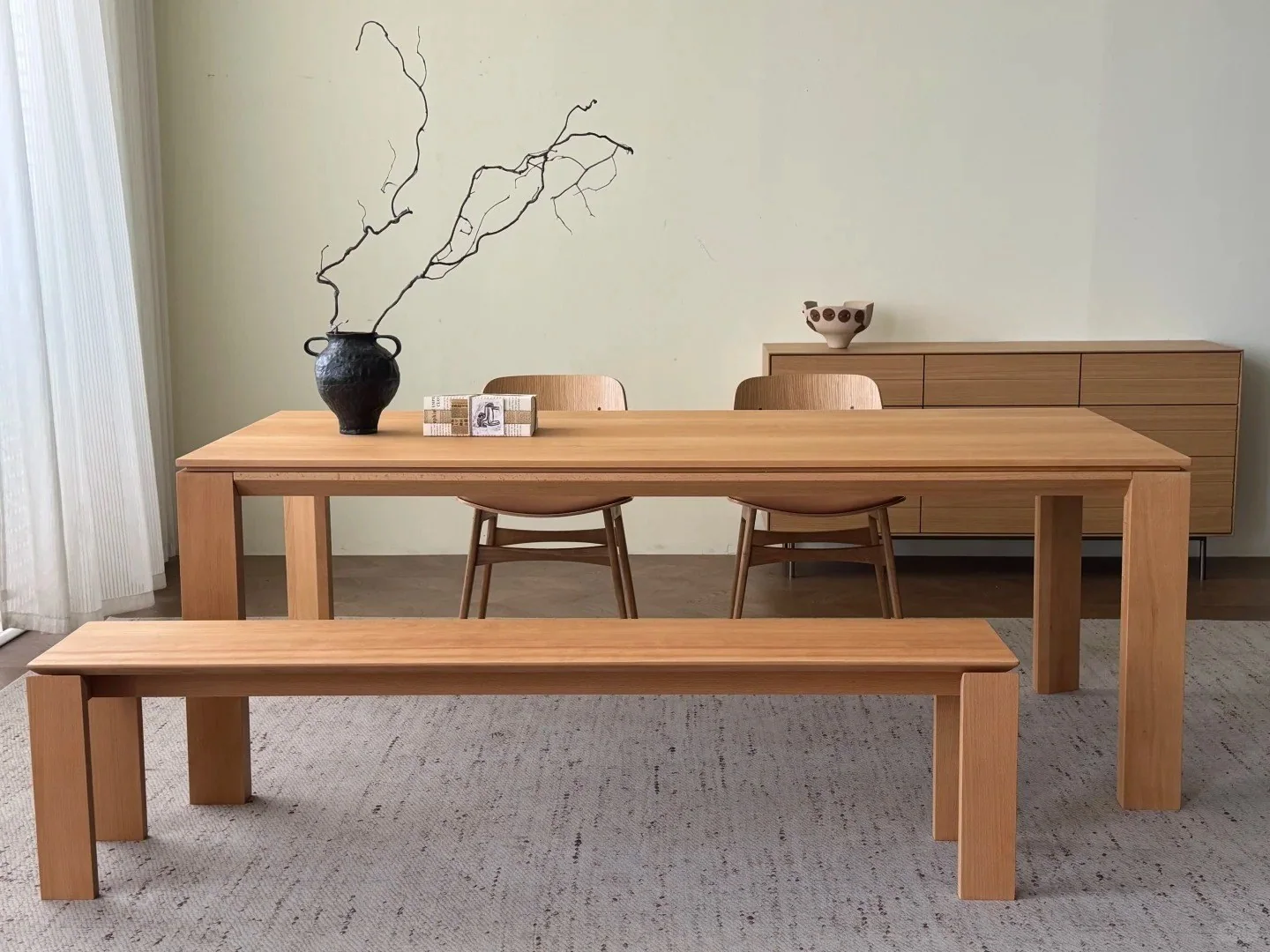 Light wood dining table and matching bench