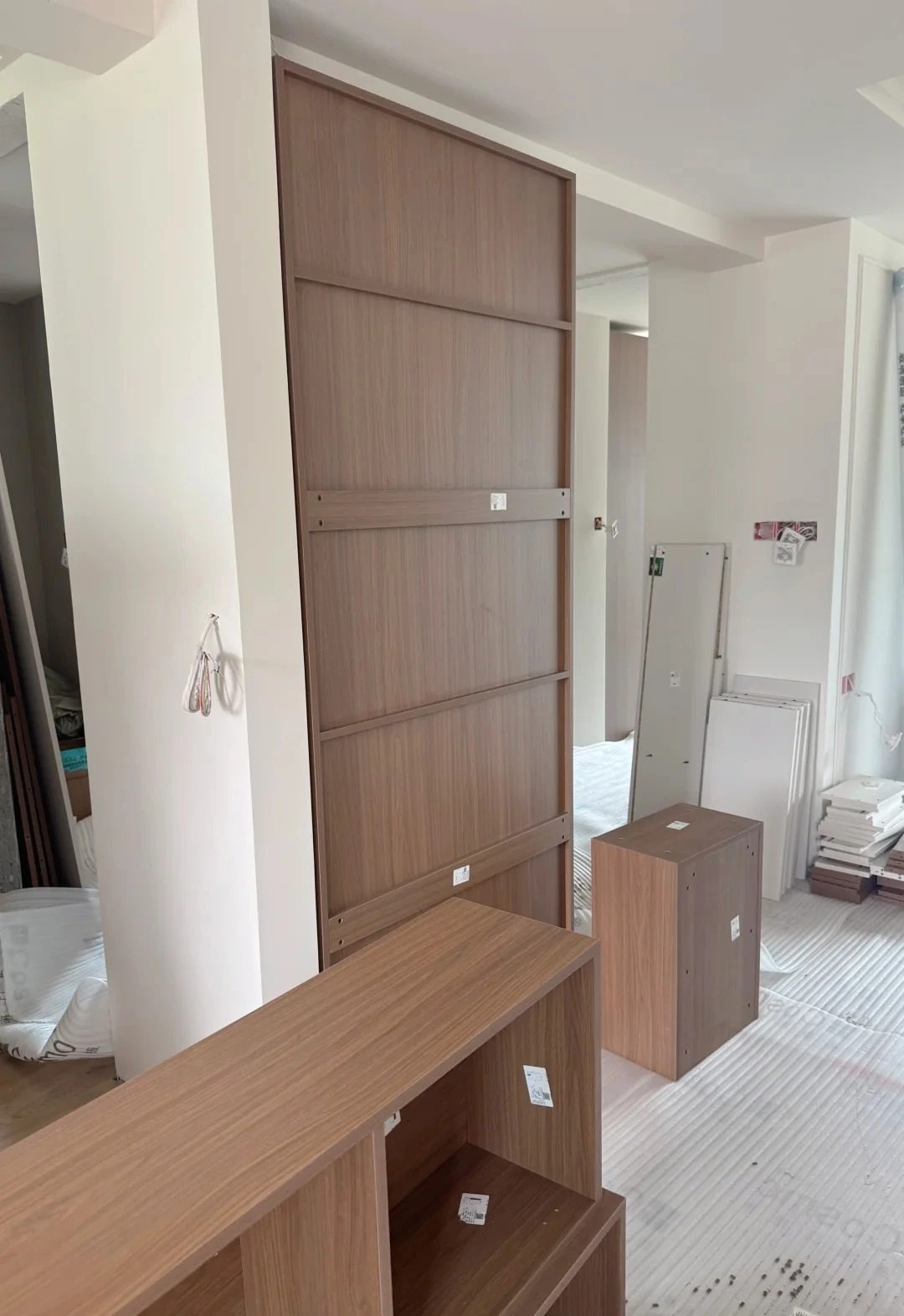 Cabinet carcass parts being assembled on site