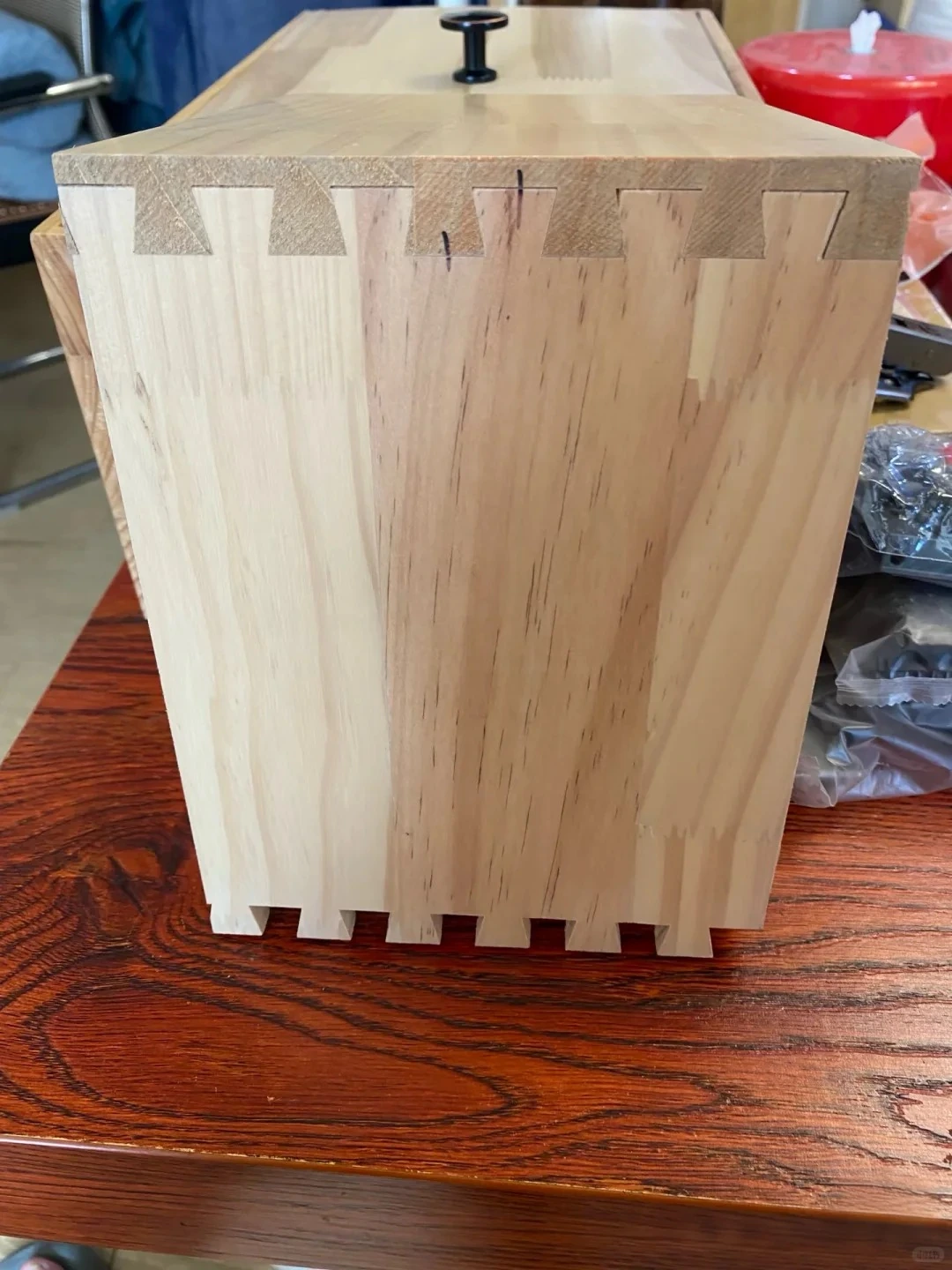 Exposed interlocking solid-wood cabinet corner joint