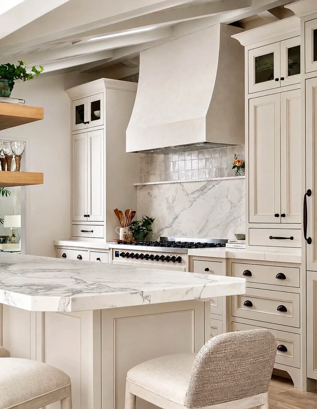 Completed light American-style kitchen showing coordinated cabinet doors, crown details and hardware