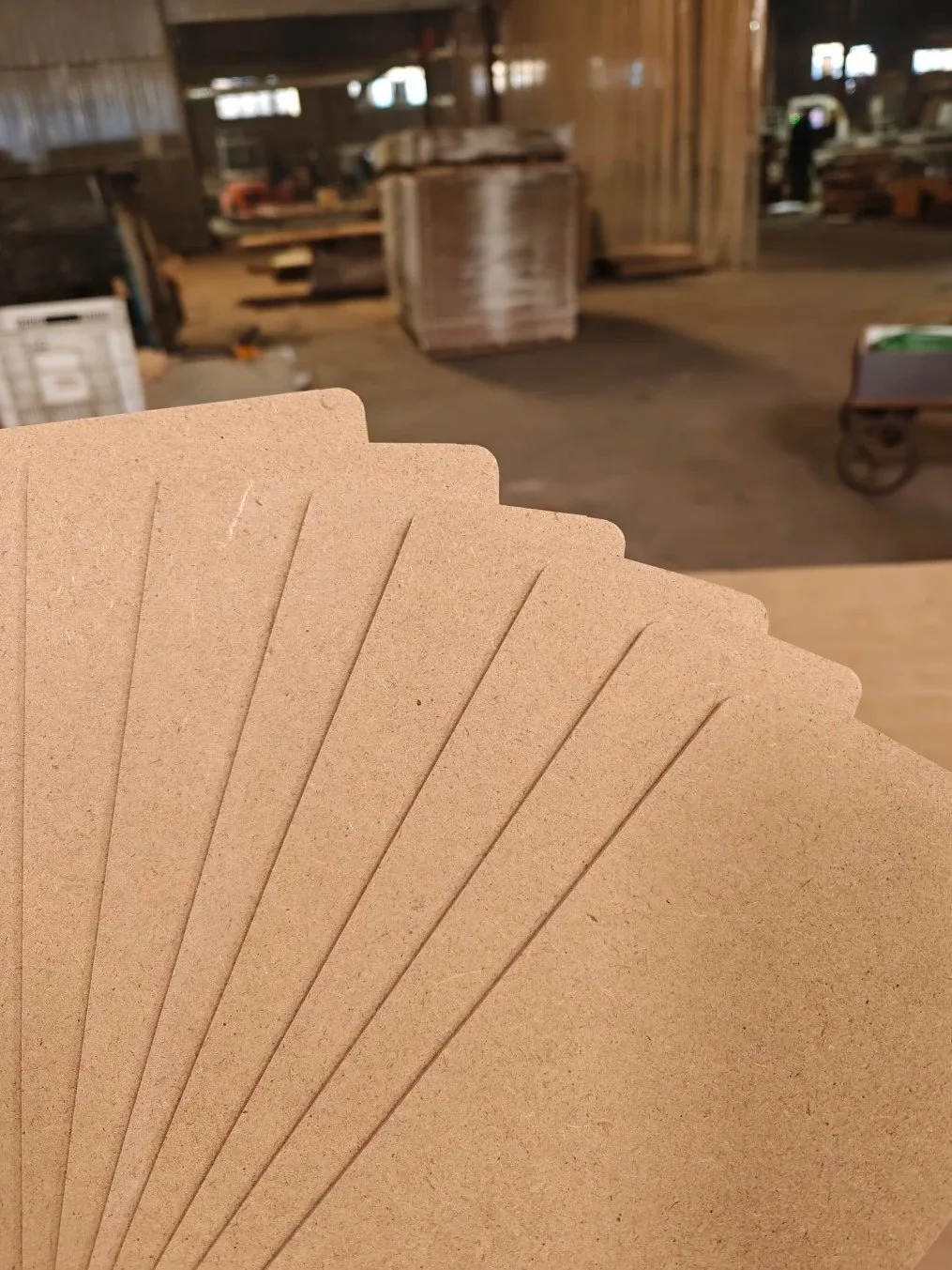 Raw MDF panels in a furniture workshop