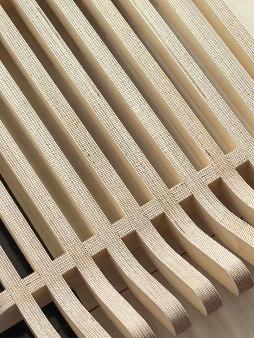 Curved laminated plywood furniture structure