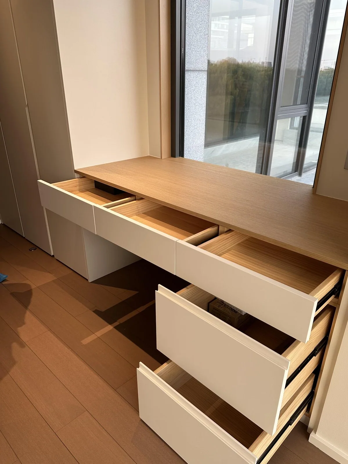 Built-in wood desk and drawers using engineered panel construction