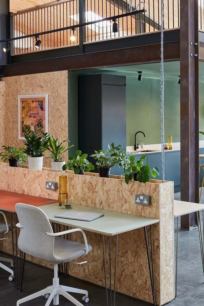 Commercial desk with an exposed strand-board surface