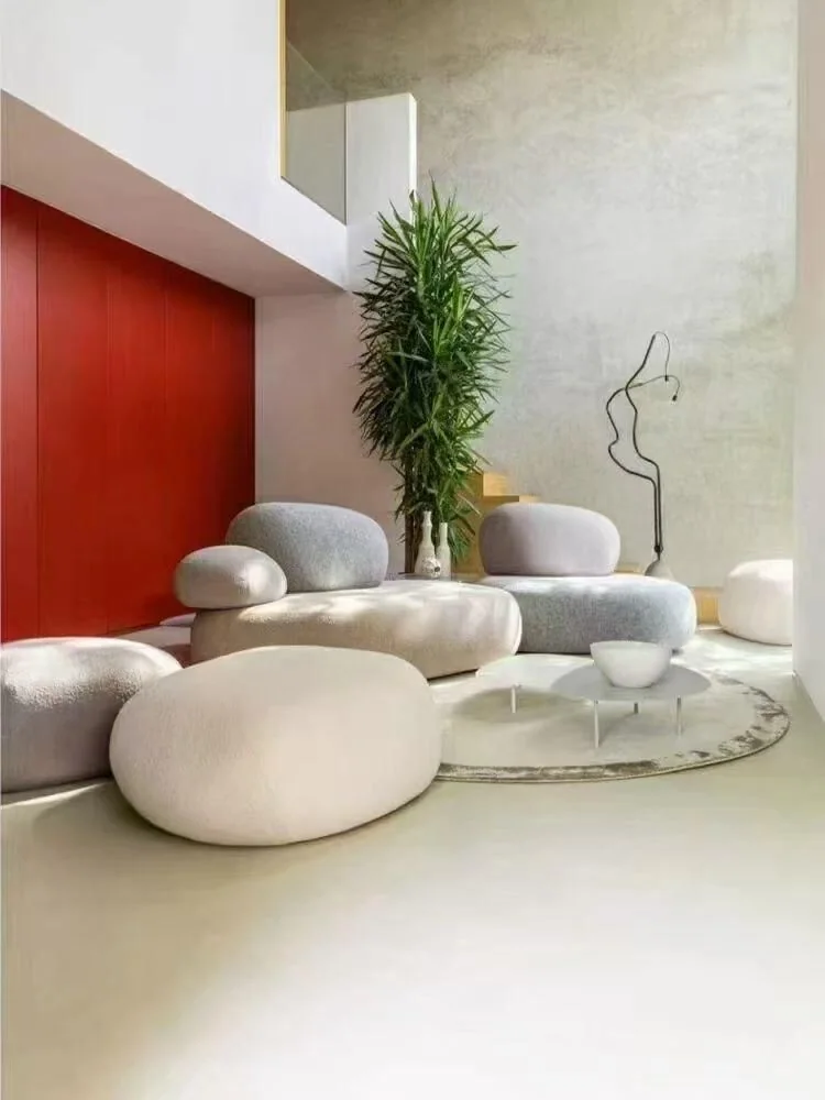 Light sculptural sofa upholstered in a technical woven fabric