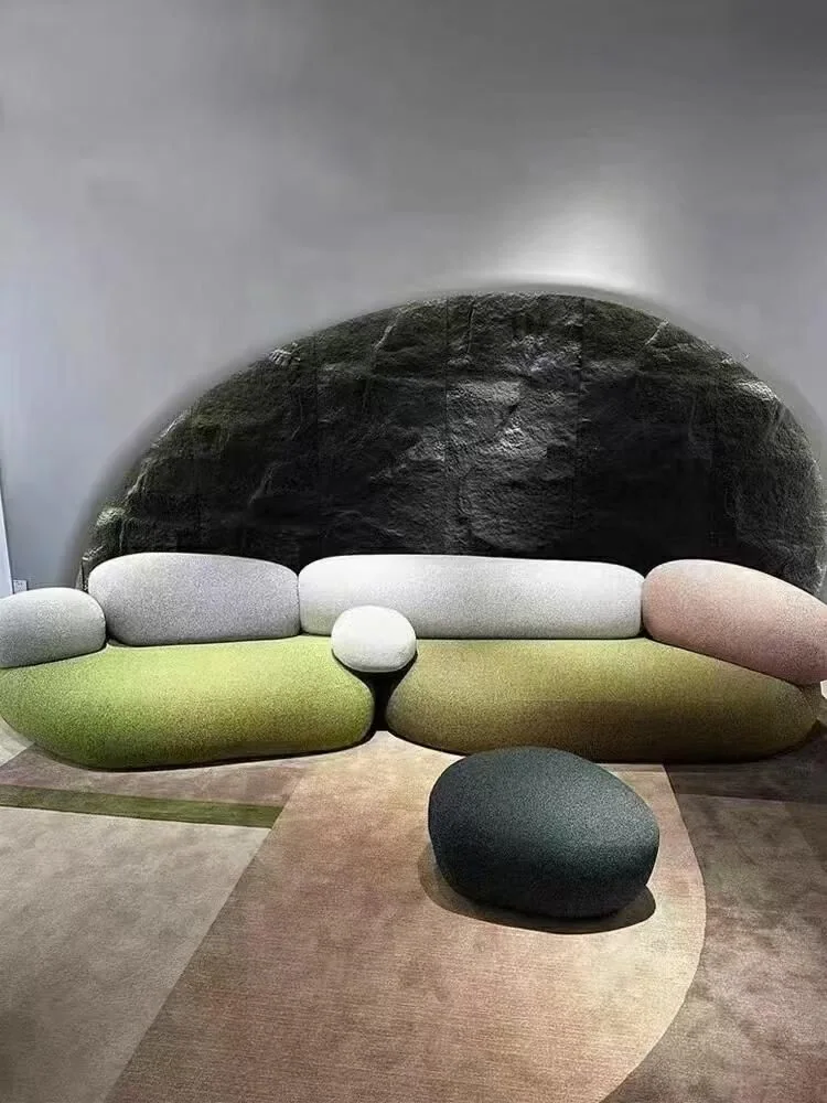 Colorful sculptural upholstered seating in a showroom setting