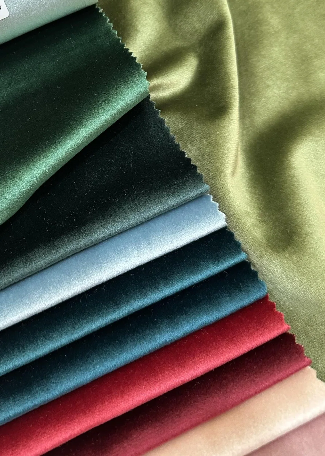 Velvet swatches in green, blue and red tones