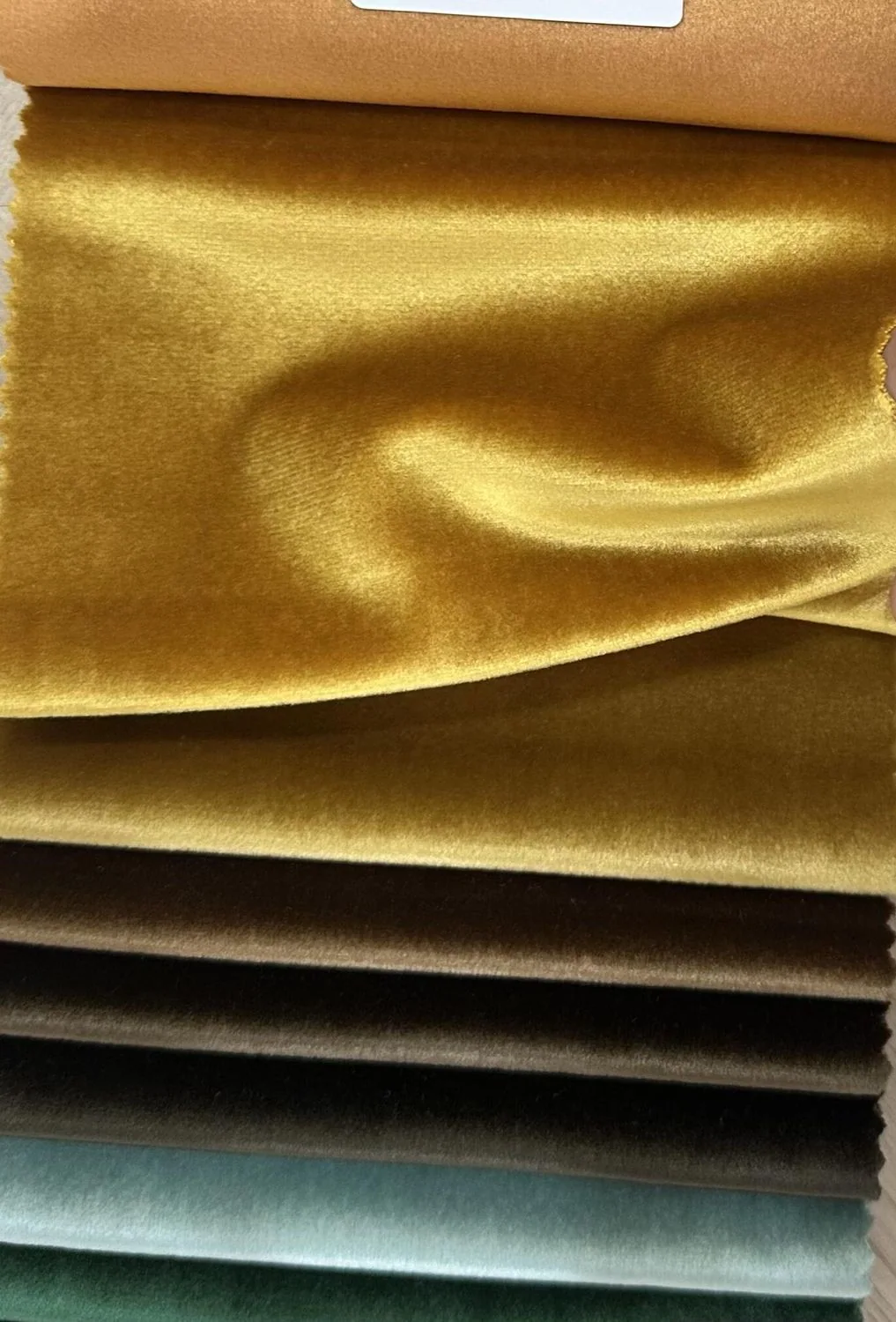 Gold and neutral velvet folded to show pile