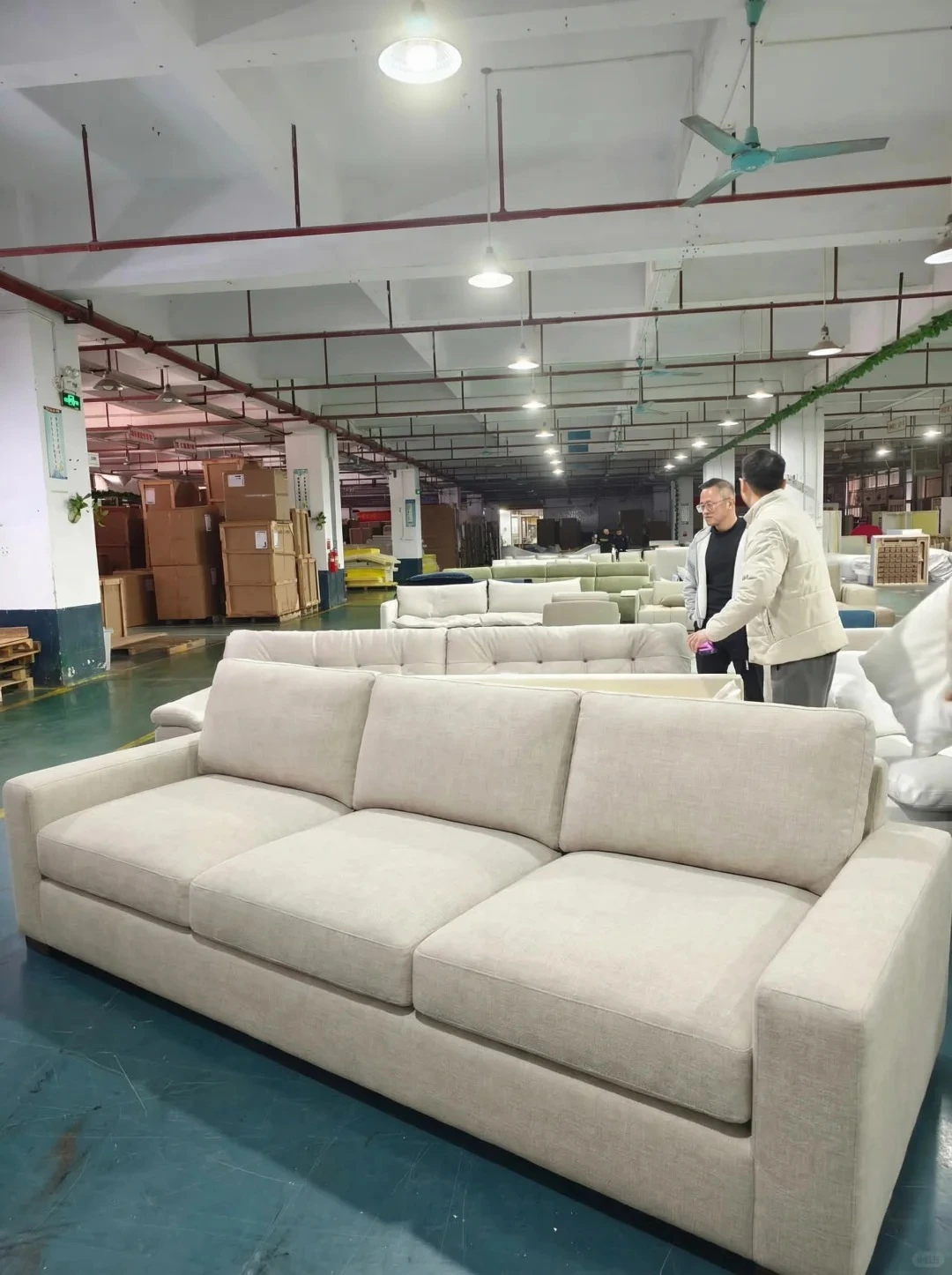 Finished white sofa on factory floor