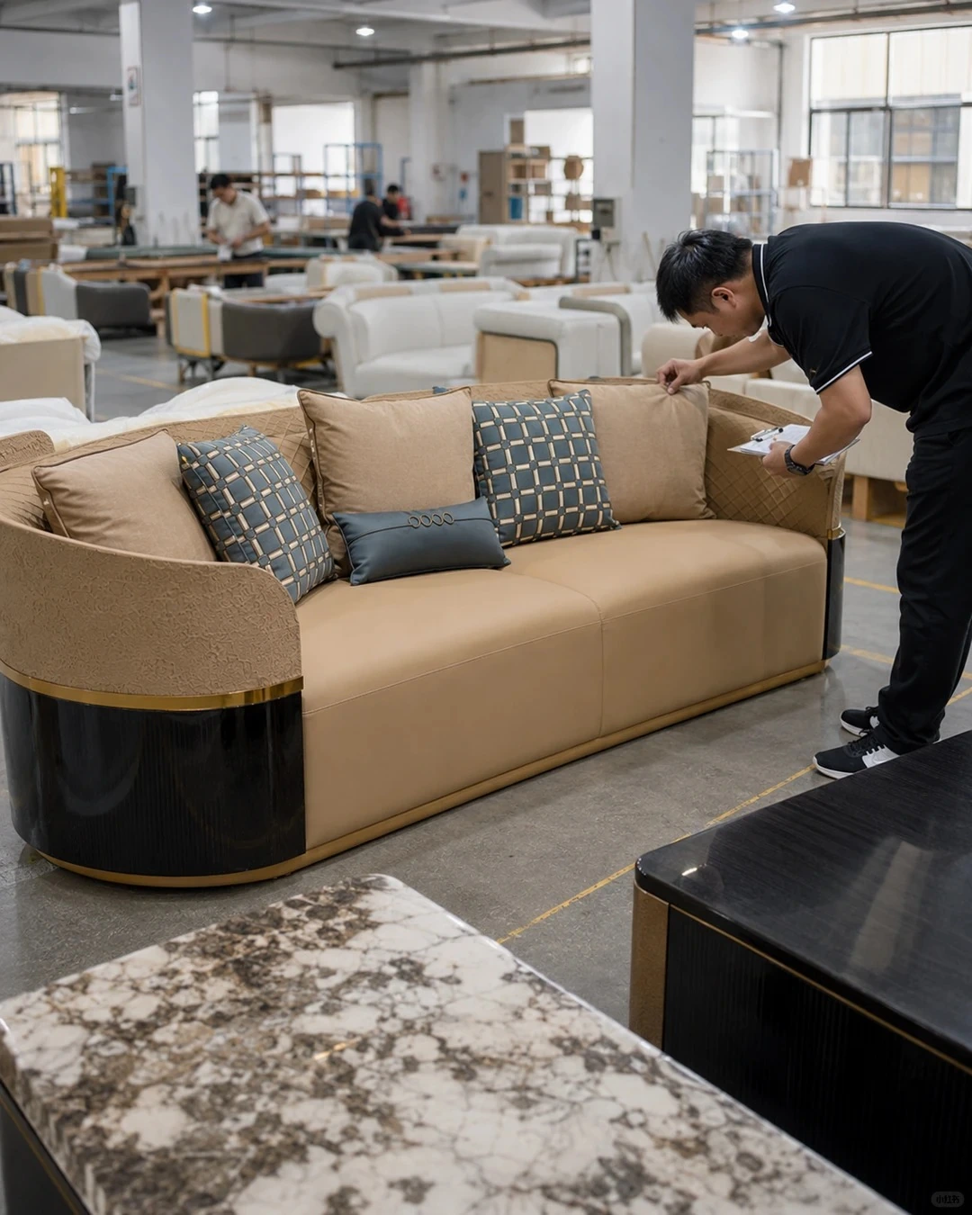 Inspector checking finished sofa in showroom