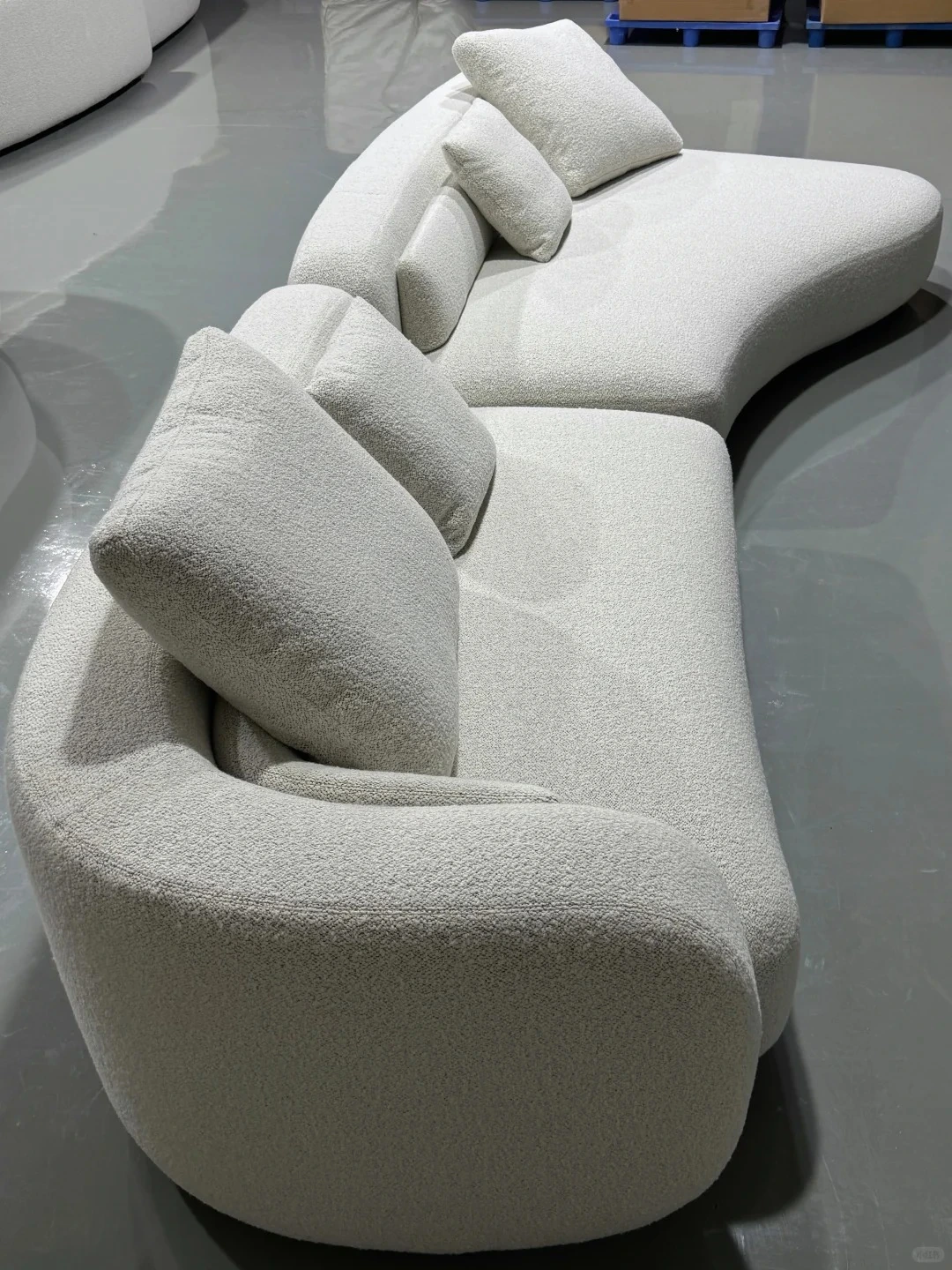White curved sofa side appearance