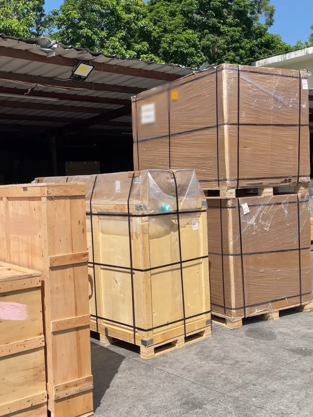 Packed sofas and furniture crates ready for shipment