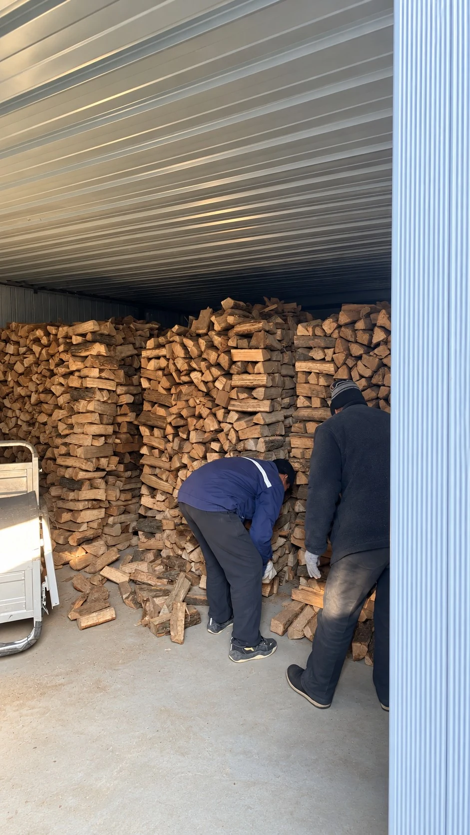 Dried timber stored under cover after the drying cycle