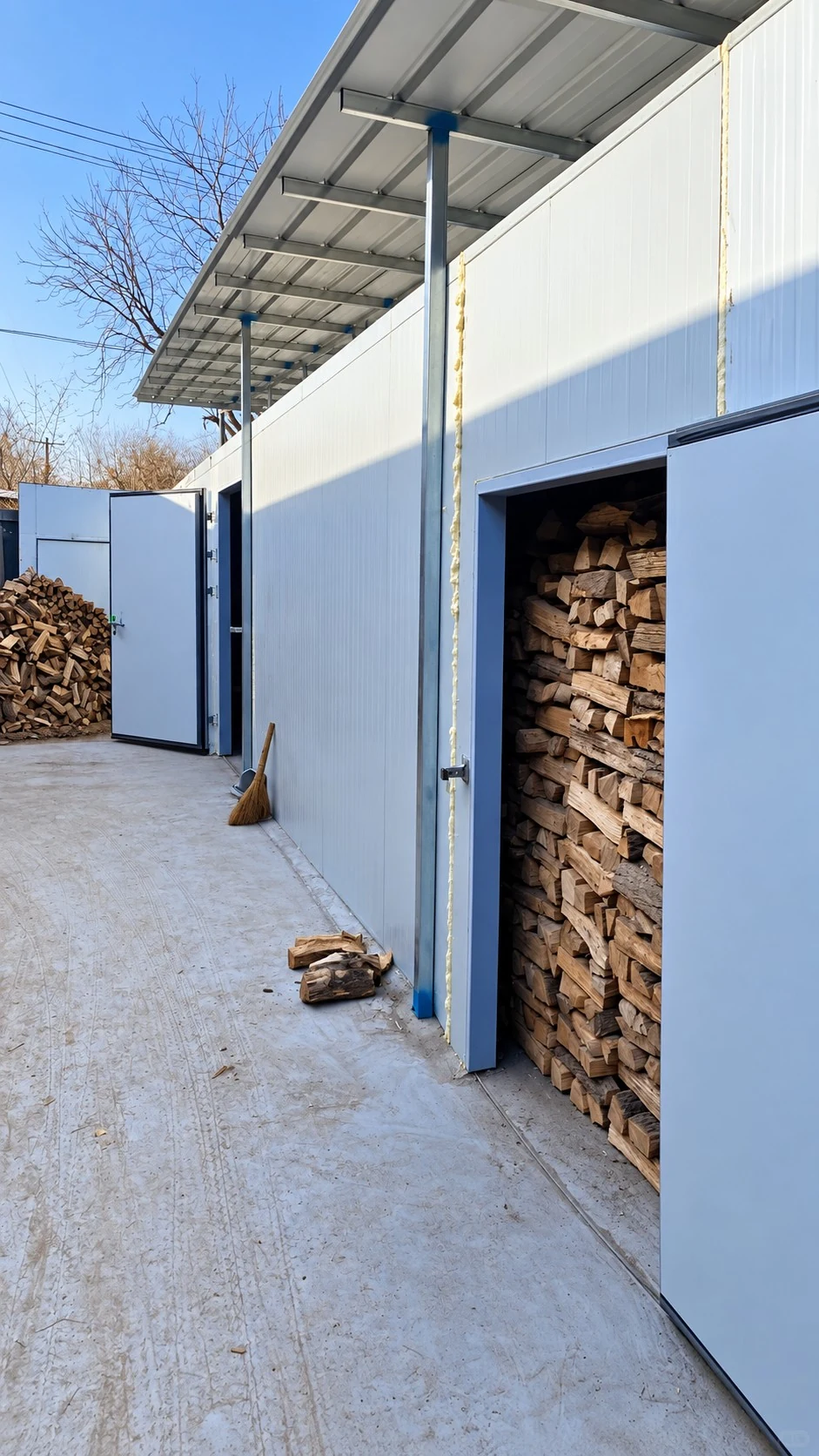 Covered kiln-drying and timber storage area