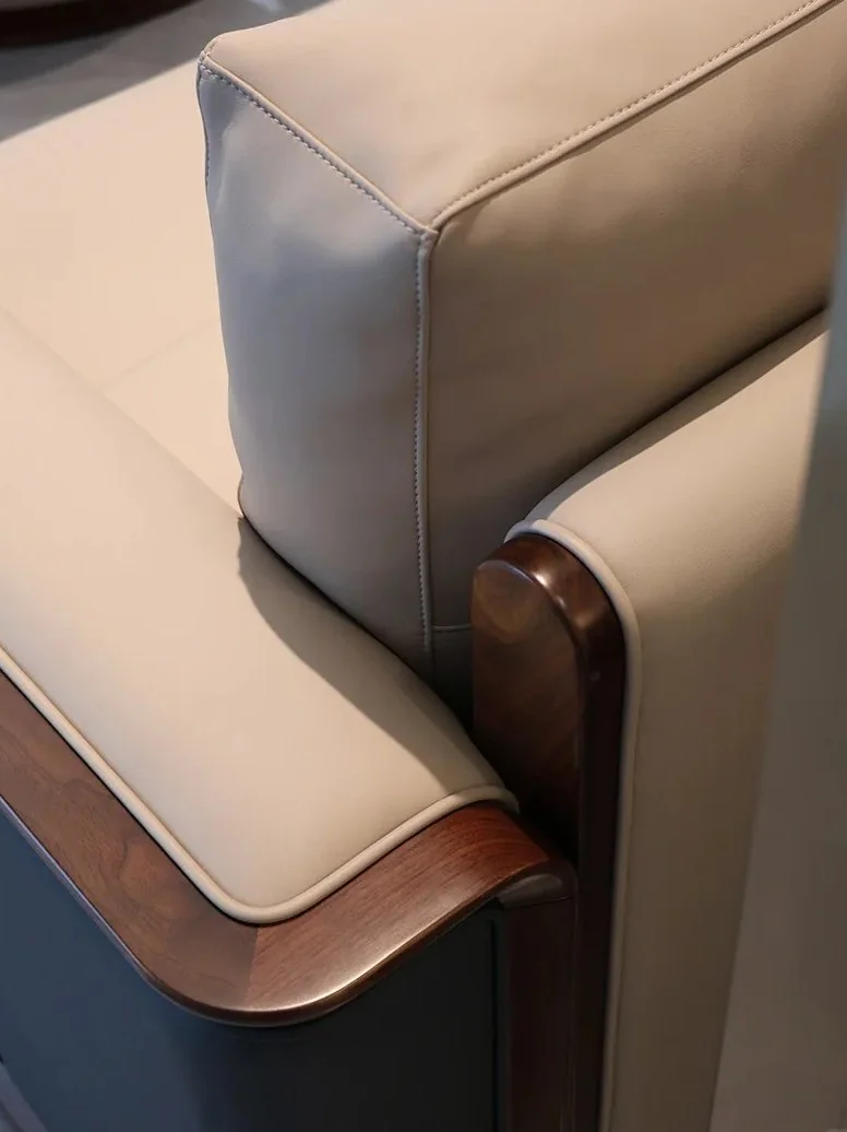 Premium leather upholstery detail with stitching and wood trim