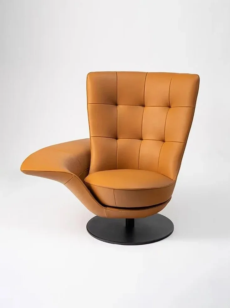 Modern tan swivel chair on a neutral background