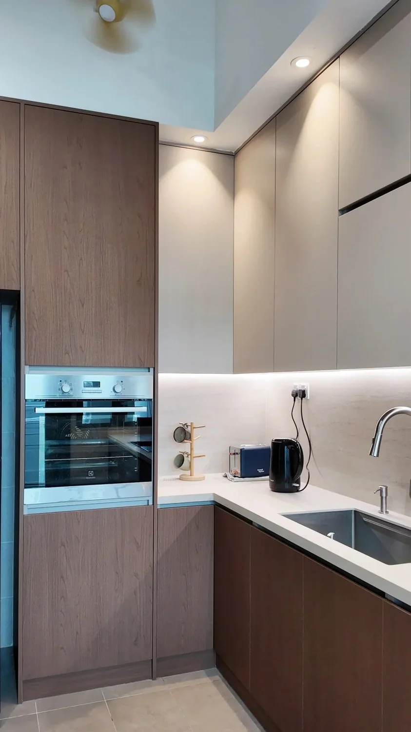Tall aluminum-framed cabinetry needs strong corner connections and accurate door geometry.