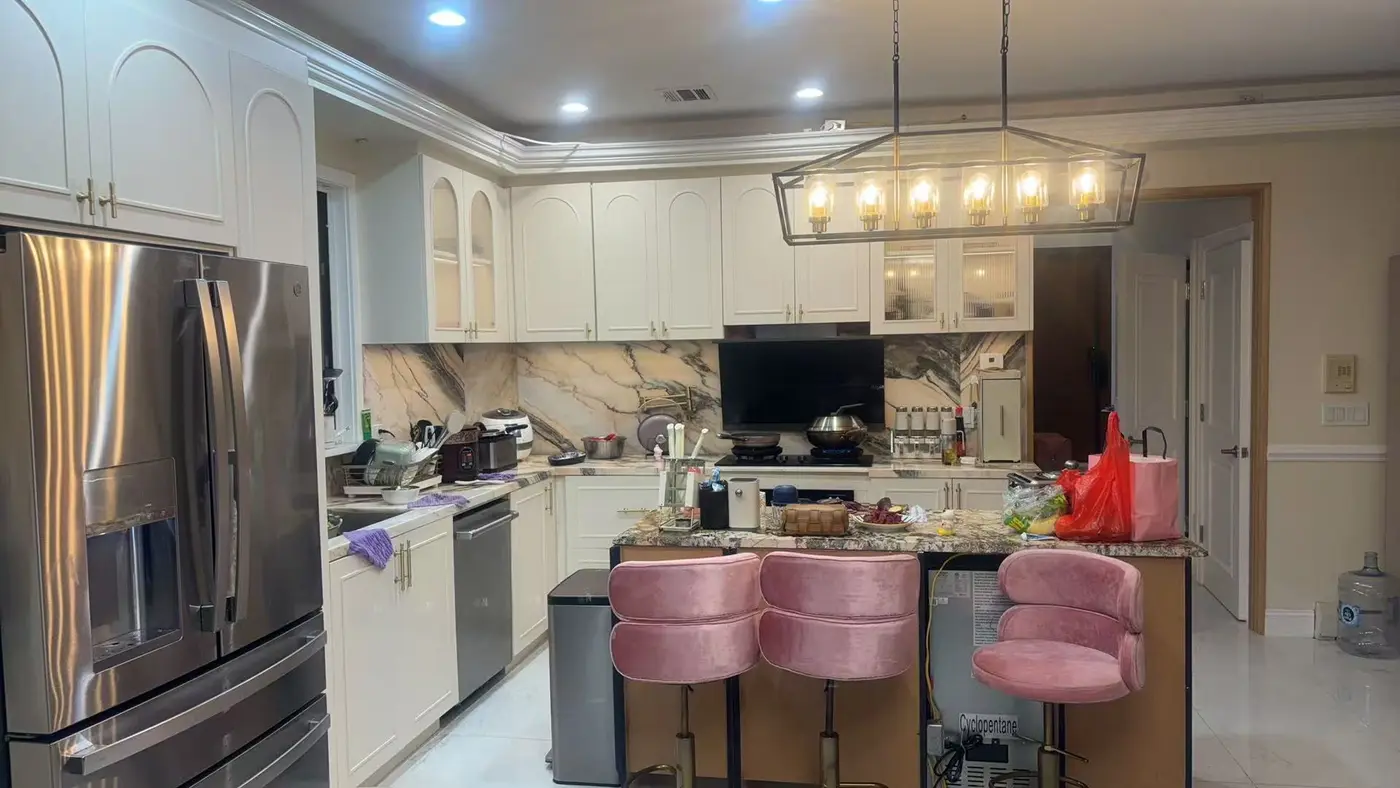 Finished kitchen with arched glass cabinets