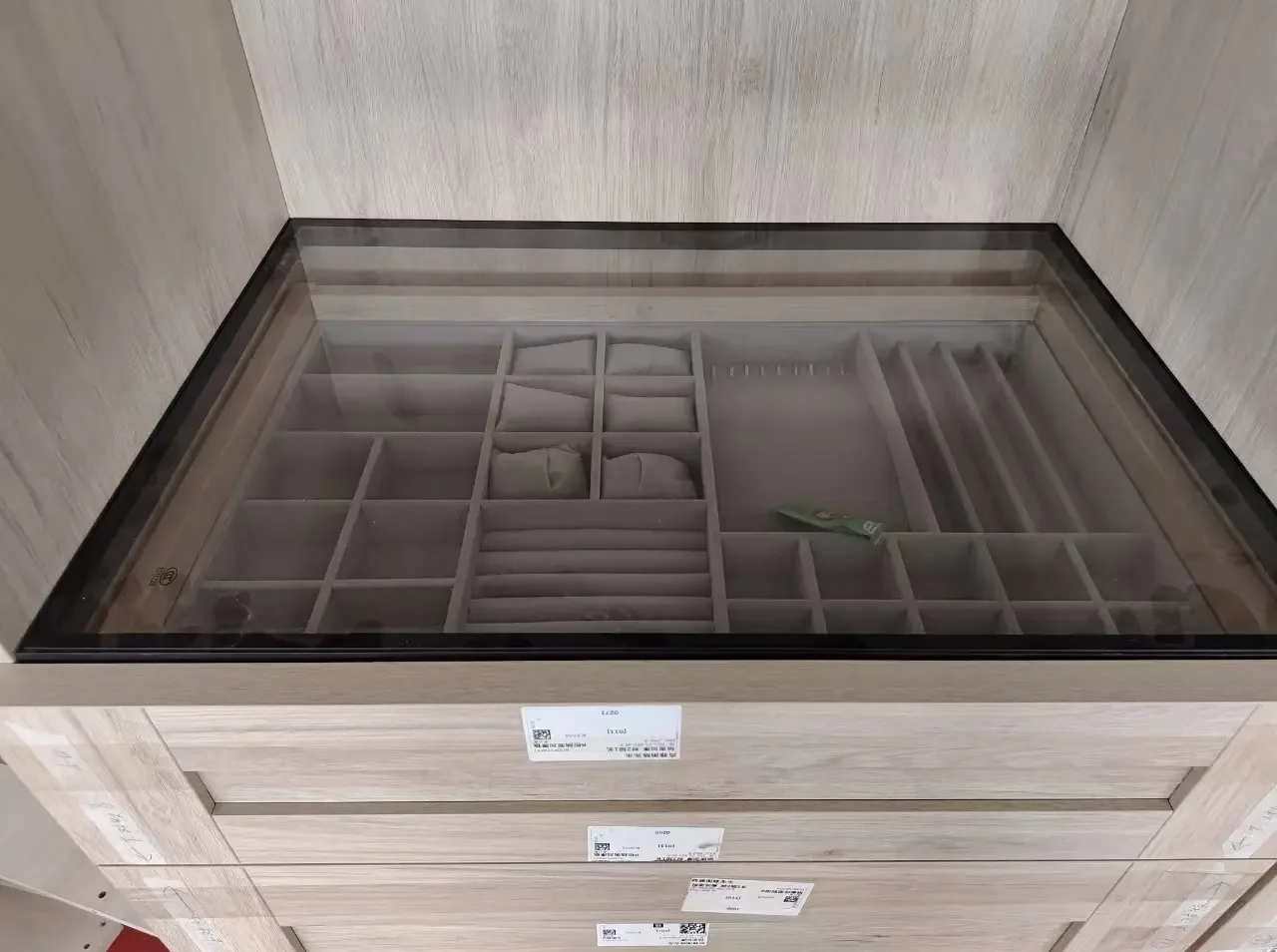 Glass top accessory drawer in factory