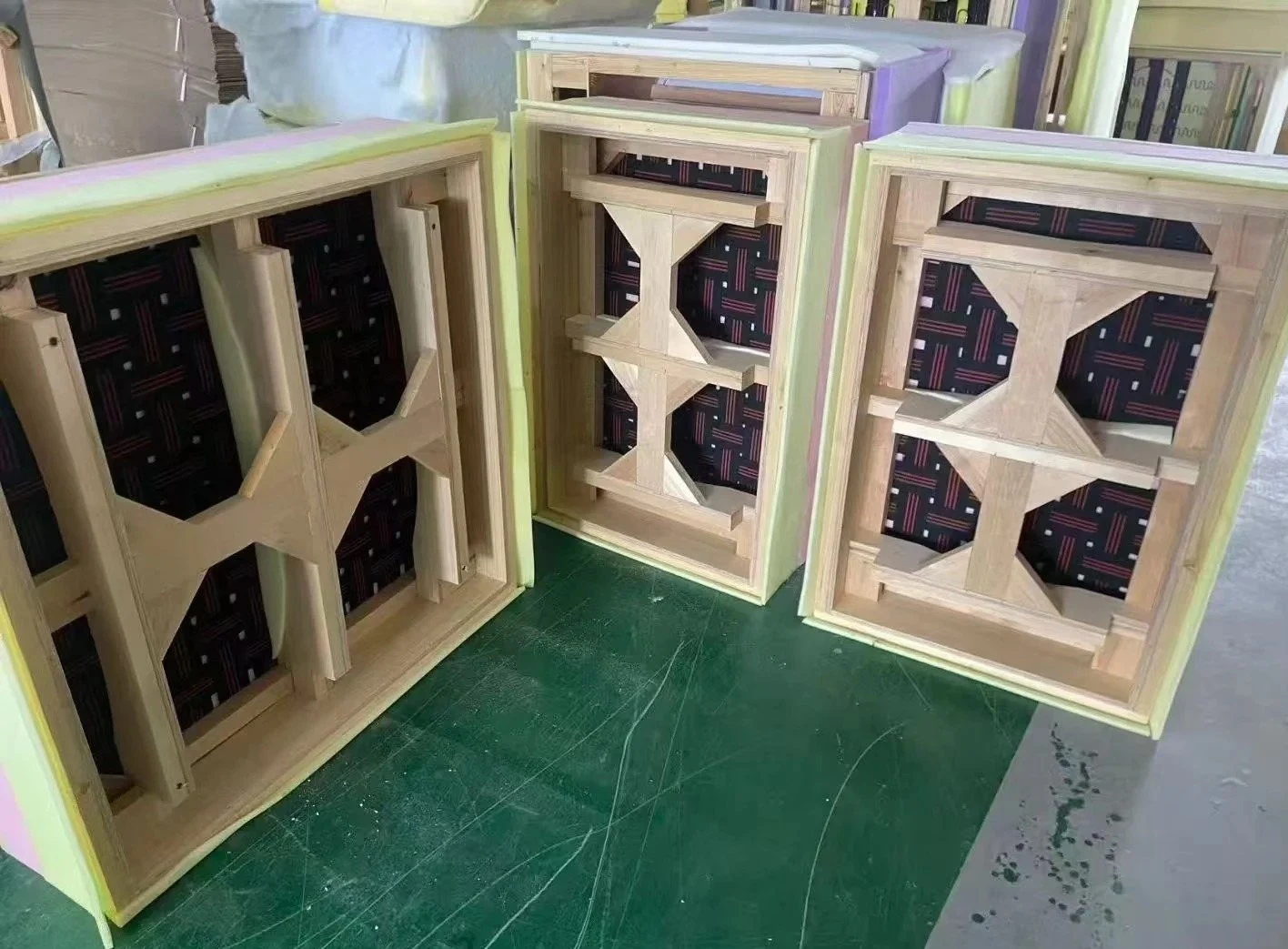 Upholstered sofa frame opened to show internal webbing and support
