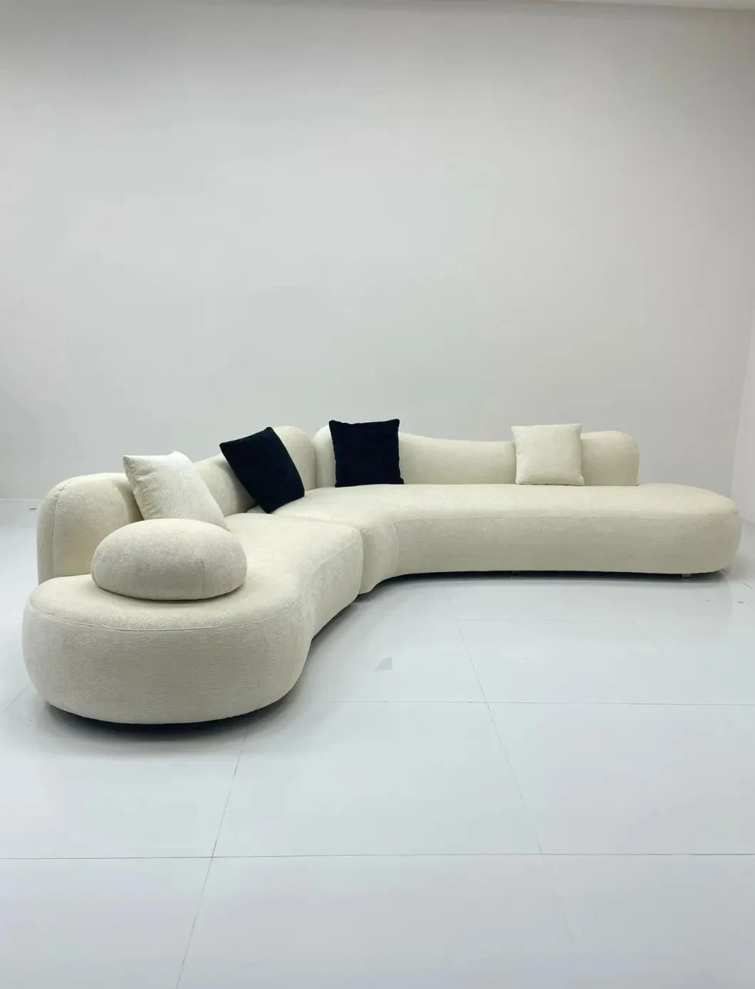 Finished curved sectional sofa