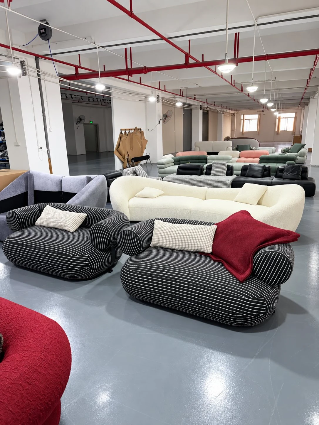Factory showroom with multiple finished sofa styles