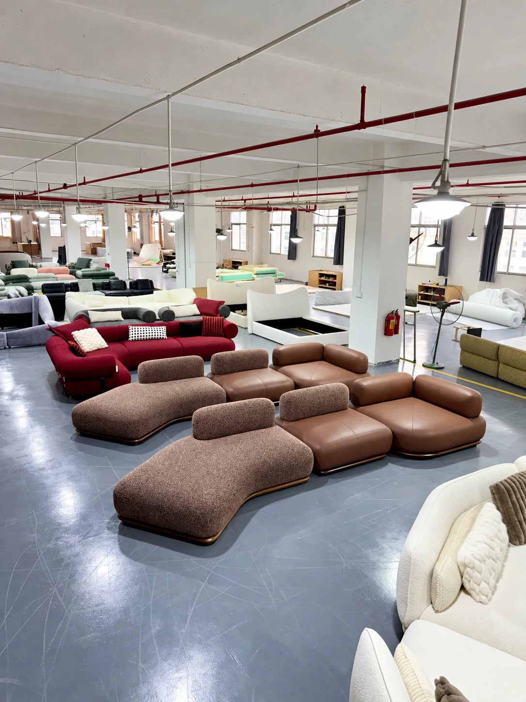 Multiple finished sofas prepared for comparison